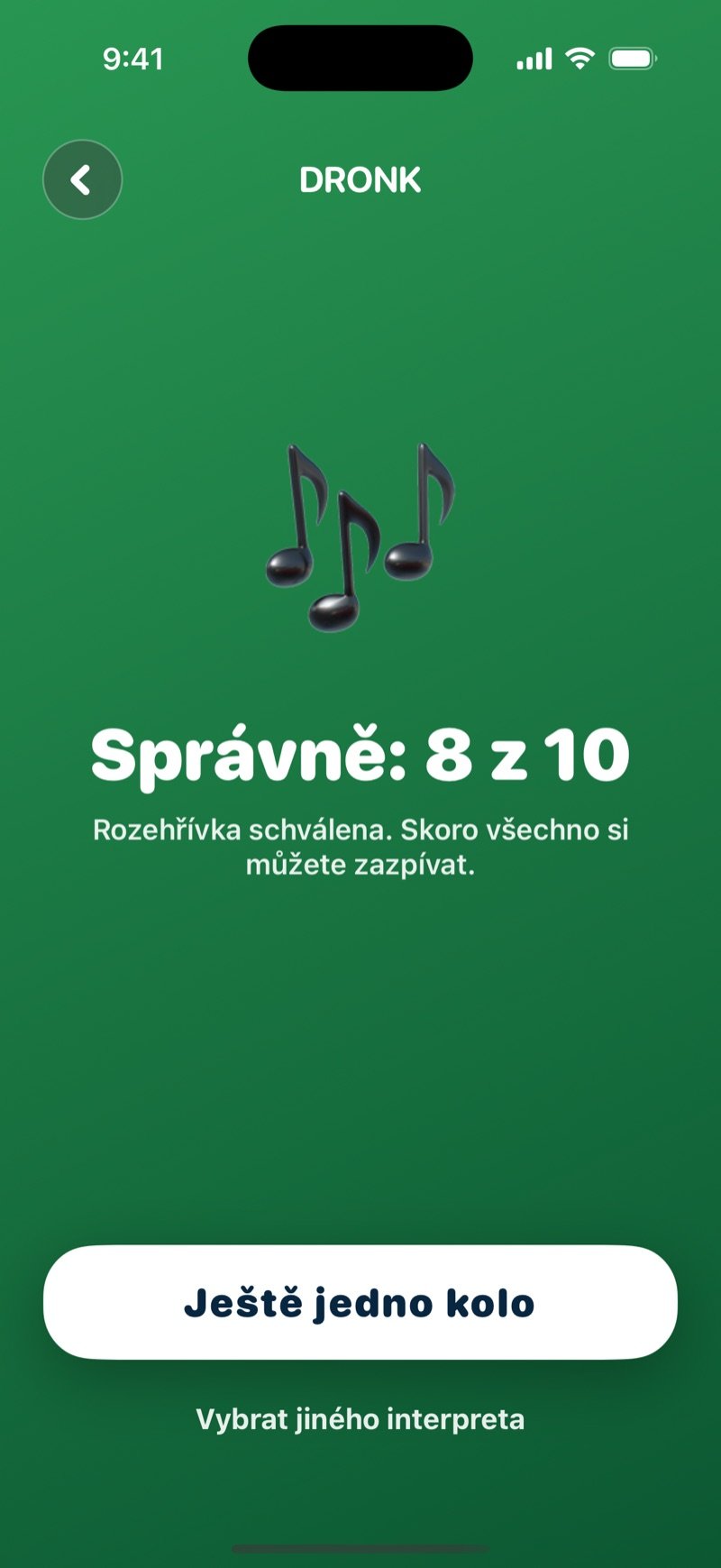 Výsledek v Hádej písničku: velká ikona noty, počet správných odpovědí, věta Rozehřívka schválena. Skoro všechno si můžete zazpívat., tlačítko Ještě jedno kolo a odkaz Vybrat jiného interpreta