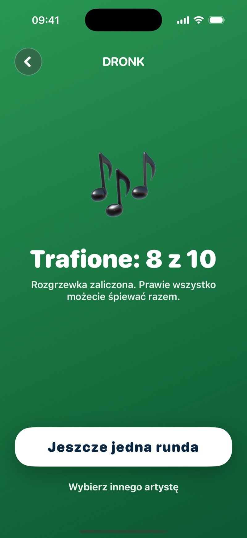 Ekran wyniku Zgadnij piosenkę: duża ikona nutki, 8 of 10 correct, linia Warm-up approved, you can sing along to most of it, przycisk One more round i link Pick another artist (zrzut z wersji angielskiej)