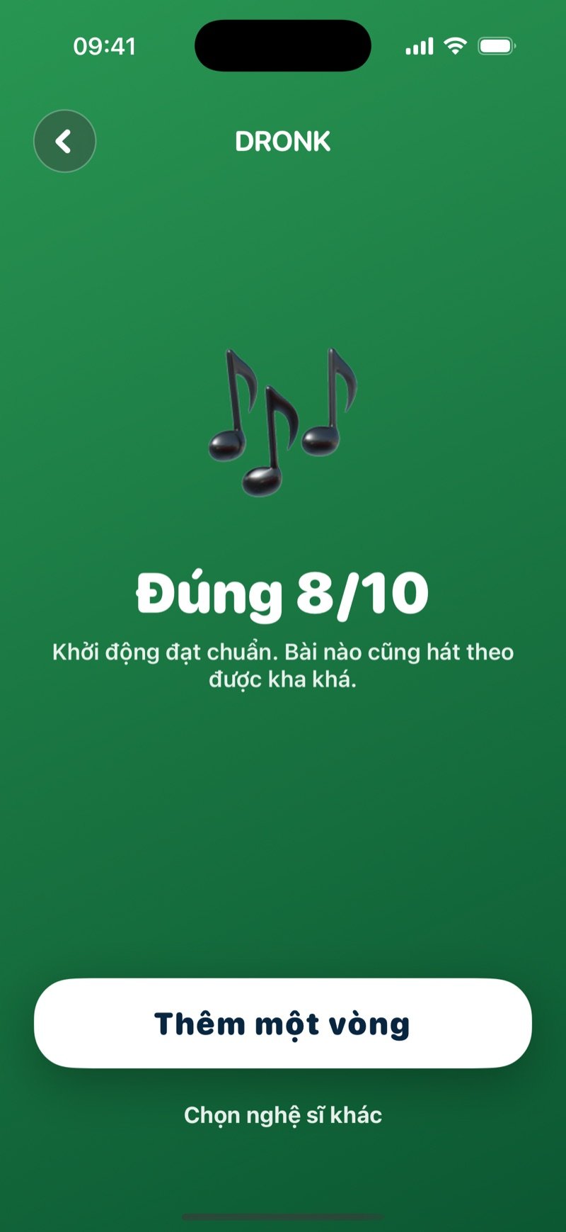 Màn hình kết quả của Đoán tên bài hát: biểu tượng nốt nhạc lớn, số câu trả lời đúng, một câu khen ngắn, nút Thêm một vòng và liên kết Chọn nghệ sĩ khác