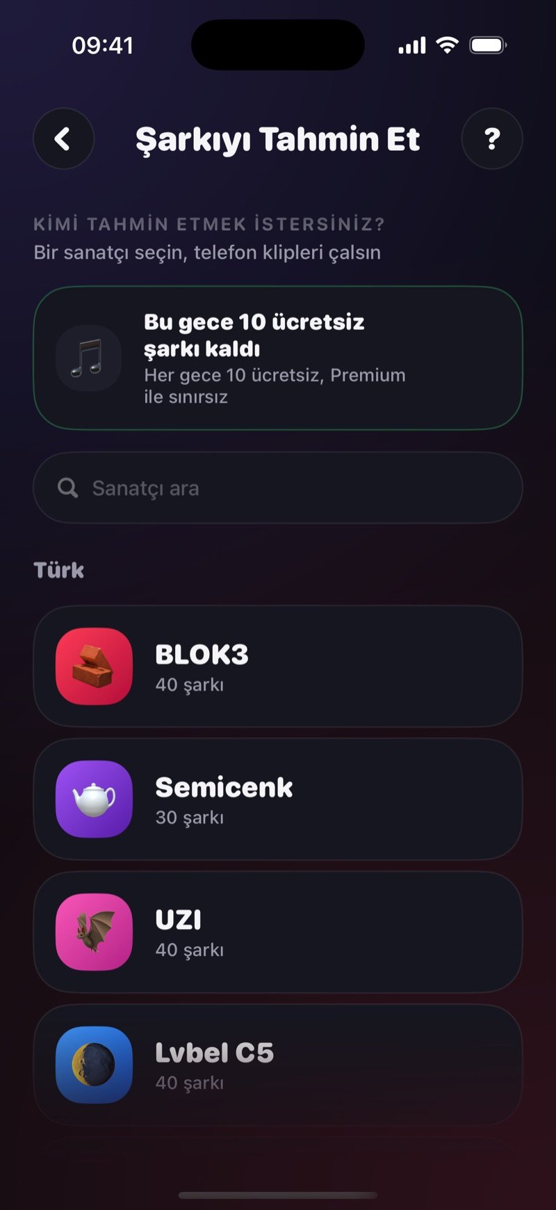 Şarkıyı Tahmin Et sanatçı seçici: kimi tahmin etmek istediğiniz sorusu, bu gece kalan ücretsiz şarkıları gösteren kutu, sanatçı arama alanı ve şarkı sayılarıyla sanatçı listesi