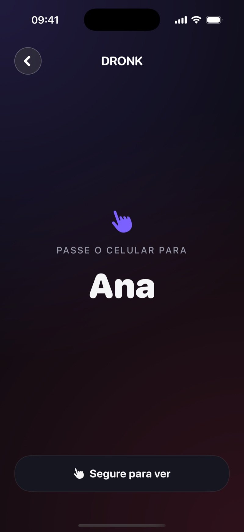 Tela de passar o celular no Dronk: Pass the phone to Olivia (passe o celular para a Olivia), com um botão Hold to reveal e a carta ainda escondida (captura da versão em inglês)