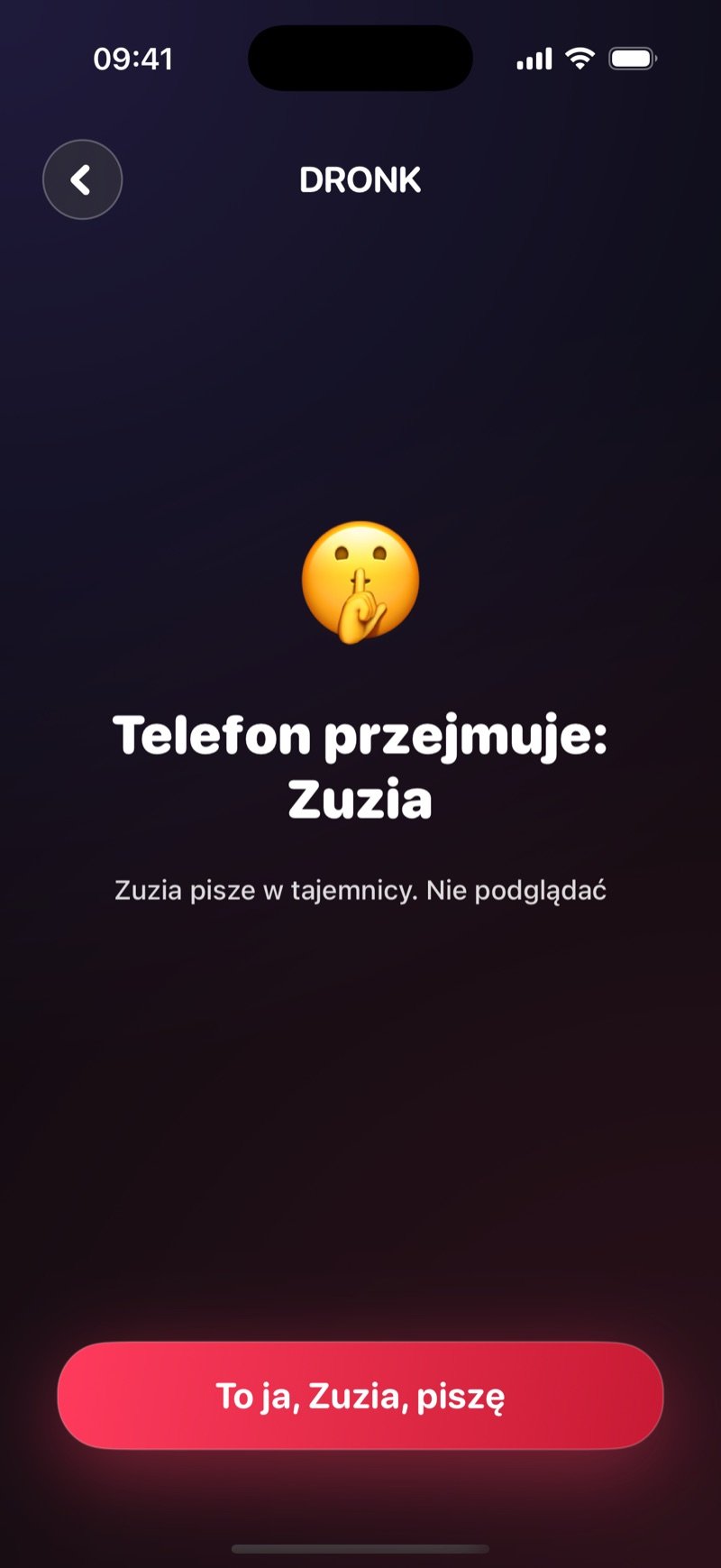 Ekran przekazania telefonu w Puszce Pandory: Pass the phone to Olivia, Olivia writes in secret, no peeking, z przyciskiem I'm Olivia, write (zrzut z wersji angielskiej)