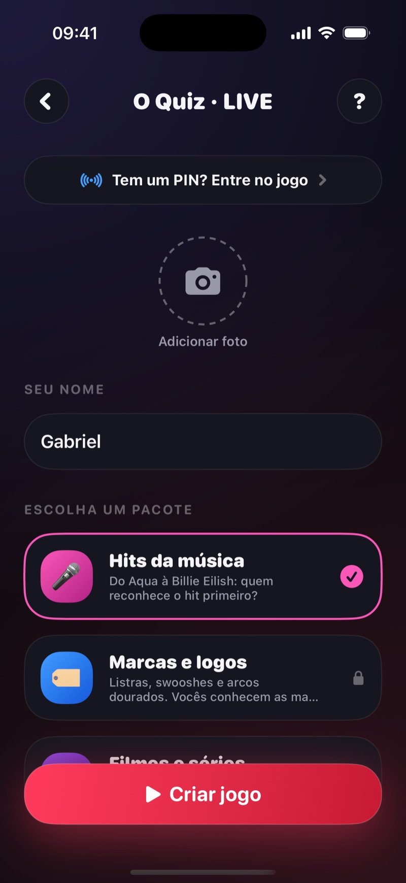 Tela de criação do Quiz LIVE no Dronk: a linha Got a game pin? Join the game, um círculo Add photo, Your name definido como Jacob, Pick a pack com Music Hits selecionado e Brands & Logos com cadeado, e um botão Create game (captura da versão em inglês)