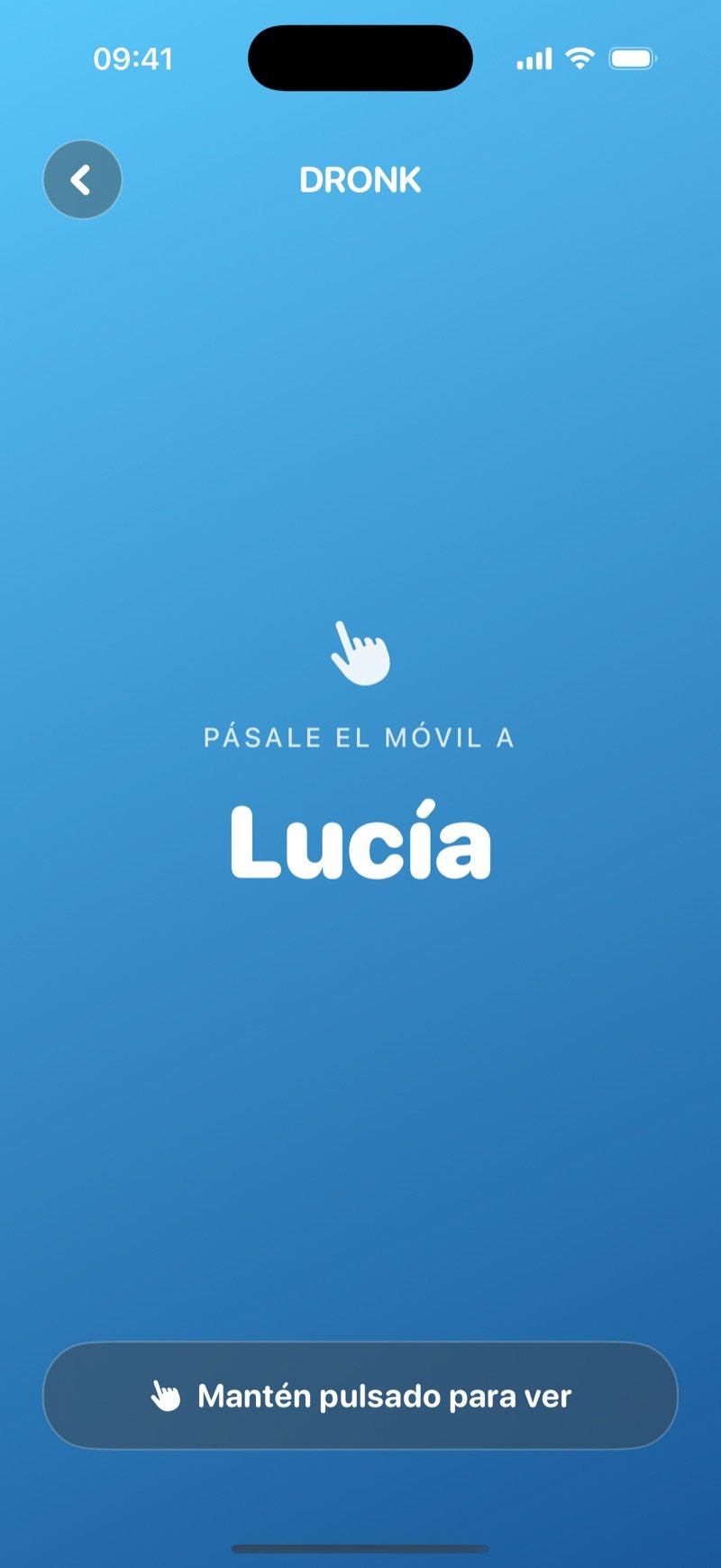 La pantalla de pasar el teléfono en El Espía sobre un degradado azul: Pass the phone to Olivia, con un botón Hold to reveal y la carta todavía oculta (captura de la versión en inglés)