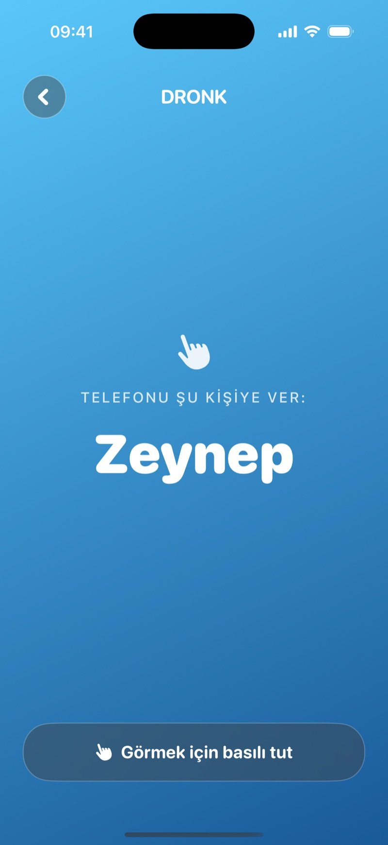 Casus'ta telefonu verme ekranı: sıradaki oyuncunun adı ve Görmek için basılı tut düğmesi, kart hâlâ gizli